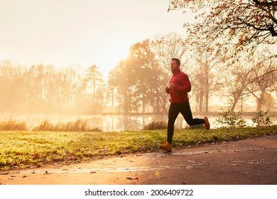 Man jogging outdoors in the fall                               