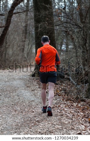 Similar – Foto Bild Junger Mann, der während des Trainings im Wald im Freien läuft.