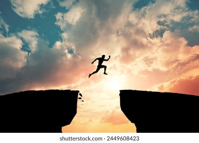 Man jump through the gap between hill. Woman jumping over cliff. - Powered by Shutterstock