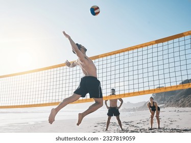 Man, jump and volleyball in air on beach by net in sports match, game or competition. Body of male person jumping for ball in volley or spike in healthy fitness, energy or exercise by the ocean coast - Powered by Shutterstock