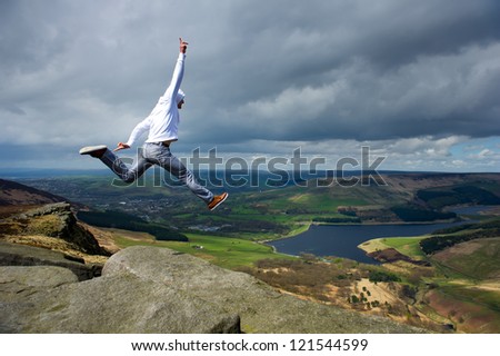 Similar – Wanderin steht auf einem Felsen am Old Man of Storr