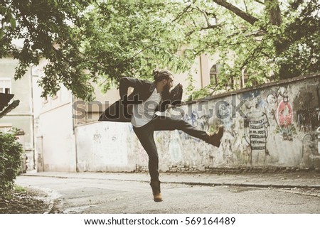 Man jumping on the street. 