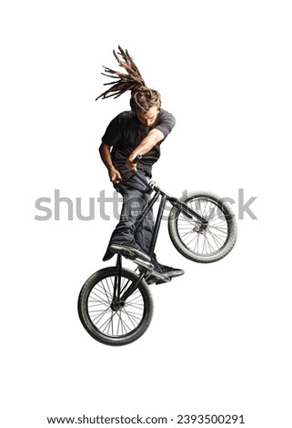Man jumping and performing tricks on BMX bicycle. Isolated on white background.