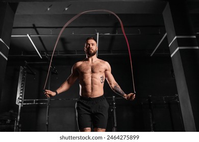 Man jumping rope, doing double-unders as part of daily workout. Routine workout for physical and mental health. - Powered by Shutterstock