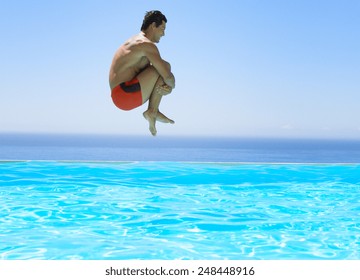 Man Jumping In Swimming Pool