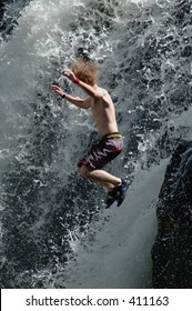 Man Jumping Waterfall