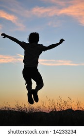 Man Jumps Above Tall Grasses Front Stock Photo 14233234 | Shutterstock