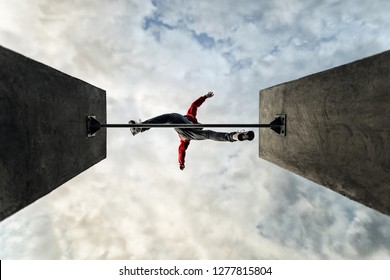 Man jumps over obstacle. Parkour photography. hype. Extreme jump. Extremely - Powered by Shutterstock