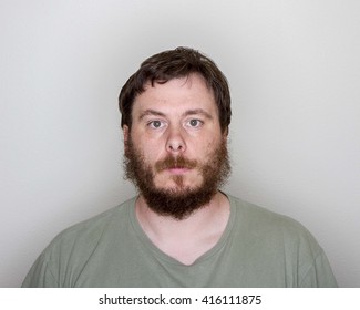 Man Just Has A Blank Stare While Looking At The Camera