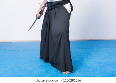 A man with katana on Iaido practice