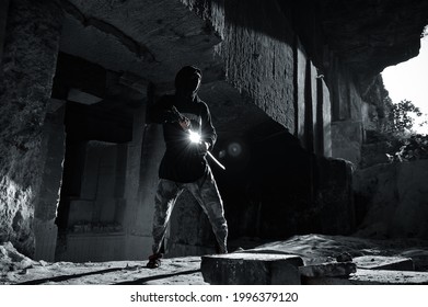 A Man With A Katana Sword In Cave