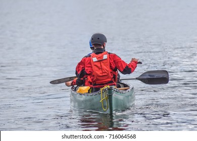 A Man Is Kayaking With Friend On Windermere Lake, Windermere, Cumbria’s Lake District National Park, Northwest England, United Kingdom.