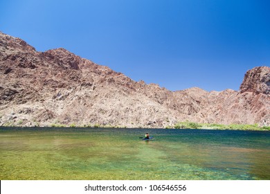 A Man Kayaking In Lake Mead, Nevada, USA