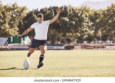 Man, kick and rugby on field for fitness, intense training and strong leg muscle development. Ball sport, coordination practice and male athlete in motion for score, game and goal for national team - Powered by Shutterstock