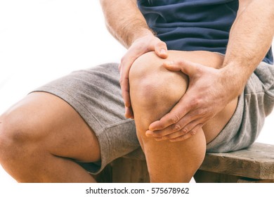 Man With Knee Pain Over White Background