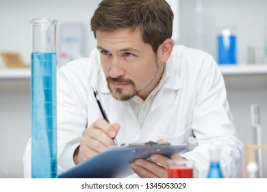 Man In The Lab Testing New Cleaning Solution Detergent