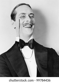 Man Laughing And A Monocle