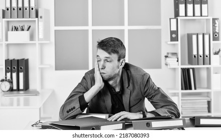 Man lawyer sleepy documents folders workplace, overwork problem concept