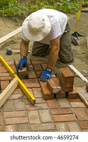 Man Laying Brick Patio Stock Photo 4659274 | Shutterstock