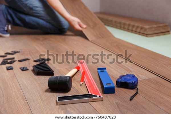 Man Laying Laminate Flooring On Floor Stock Photo Edit Now 760487023