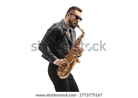 Man in a leather jacket playing a saxophone isolated on white background