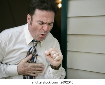 A Man Leaving Work Early Because Of A Coughing Fit.