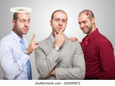 Man listening to the angel and devil self to make a choice - Powered by Shutterstock