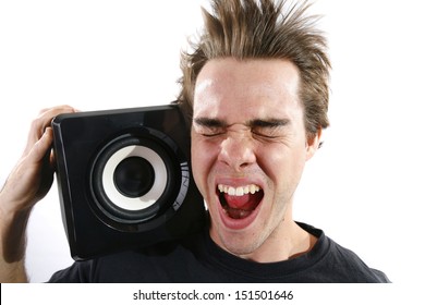 Man Listening To Very Loud Music That Blows His Hair Back. 