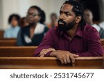 Man listens attentively to the pastor