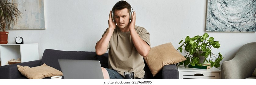 Man listens to music with headphones in a relaxed indoor setting. - Powered by Shutterstock