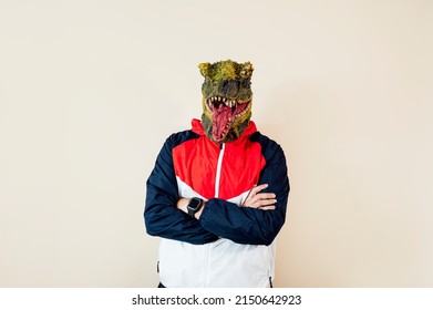 Man with a lizard head in studio.