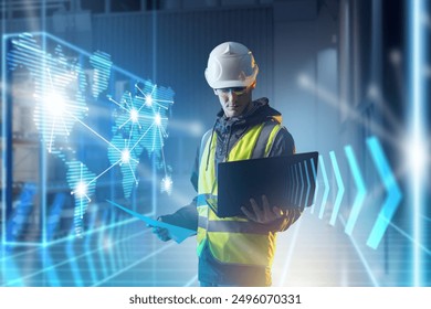 Man is logistics specialist. Storekeeper guy with laptop. Logistics warehouse manager. World map metaphor for international shipment. Man is logistician in hardhat and yellow vest. Art focus - Powered by Shutterstock