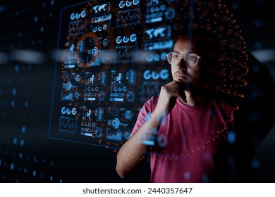 Man look at the dashboard with graphs and charts. Concept of data management system, business intelligence, data statistics, marketing analysis, key performance indicators (KPI) and analytics. - Powered by Shutterstock