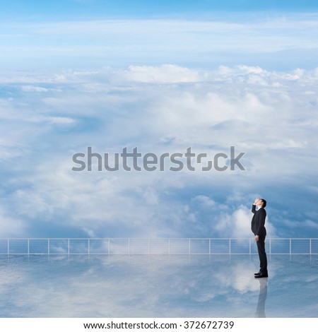 Similar – Hallig Gröde | Senior citizen stands in the calm North Sea at low tide and raises her hands to the sky