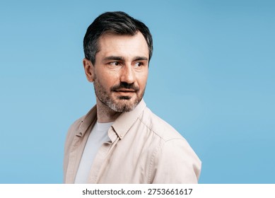 Man looking back, contemplating future, having an idea or thinking about something