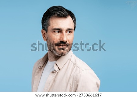 Man looking back, contemplating future, having an idea or thinking about something