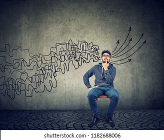 Man Looking Up Brainstorming Getting His Thoughts Together Planning Making Conclusions Isolated On Gray Wall Background