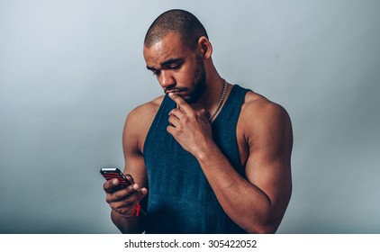 man looking at cell