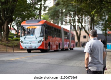 Man Looking At Curitiba Bus.

Curitiba 04-22-2022