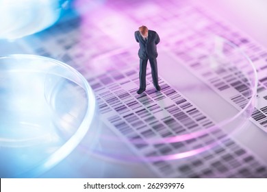 Man Looking At DNA Gel Into Petri Dish