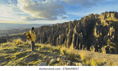 Man looking at the dramatic rock formations in Valle de las Animas, La Paz, Bolivia