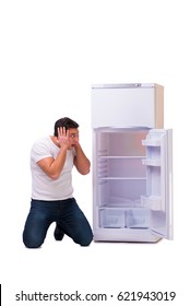 Man Looking For Food In Empty Fridge