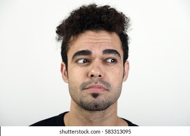 Man Looking To His Left With A Sad Expression