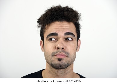 Man Looking To His Right With A Sad Expression