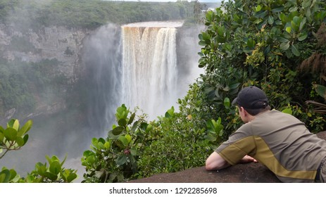 Man Looking At Kaieteur Falls In Guyana