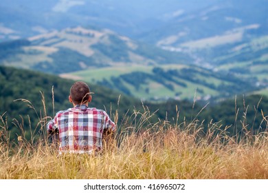 man looking at the landscape