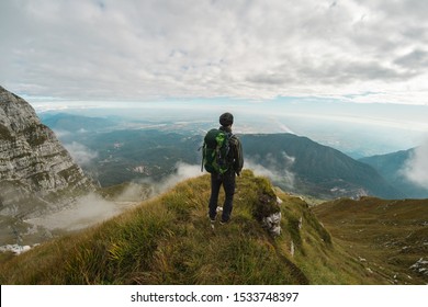 Man looking landscape from mountain - Shutterstock ID 1533748397