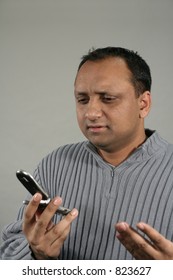 man looking at mobile