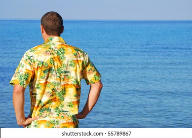 Man Looking Out To Sea Wearing Hawaiian Shirt