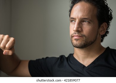 Man looking out of window
